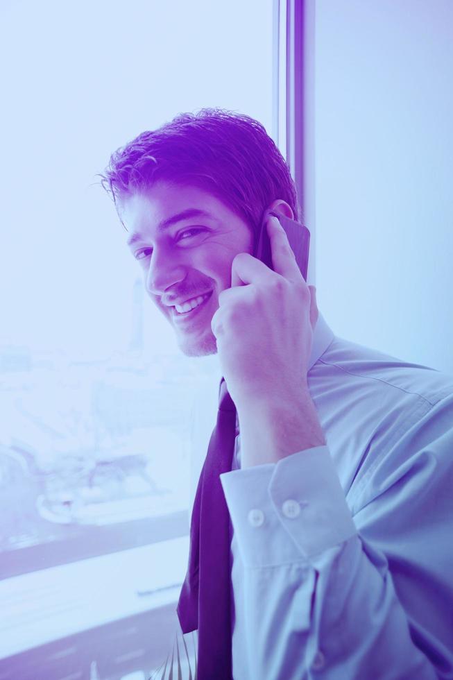 business man talking by cellphone photo