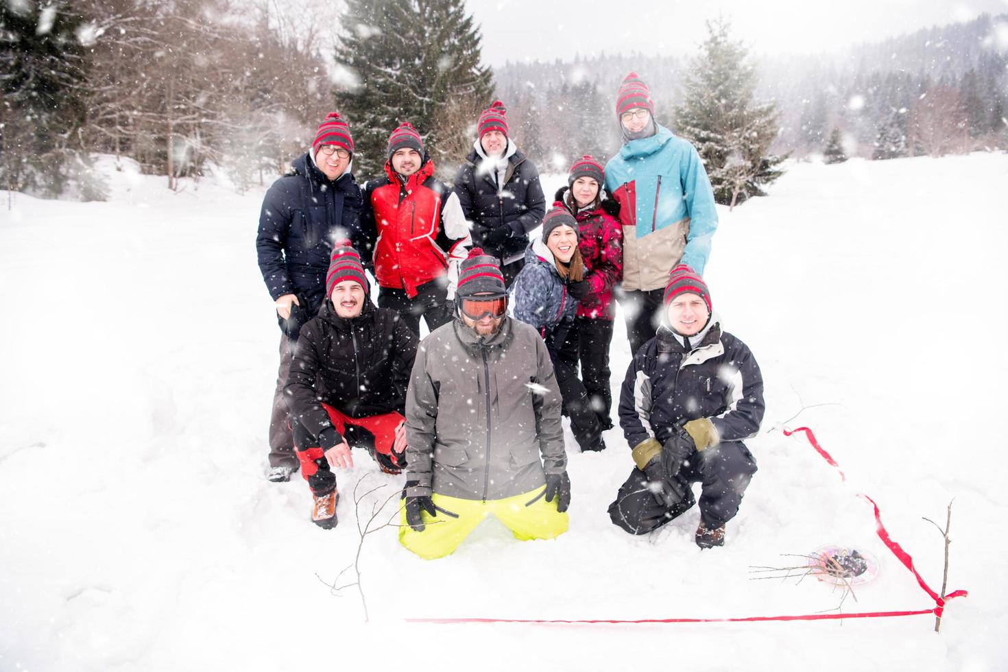 portrait of group young people in beautiful winter landscape photo