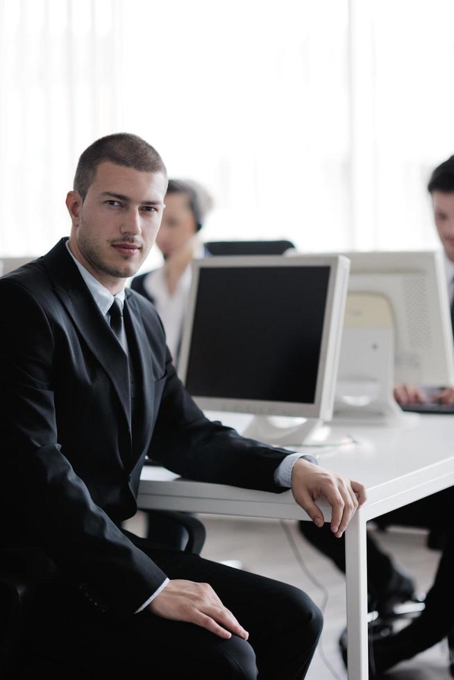 business people group working in customer and help desk office photo