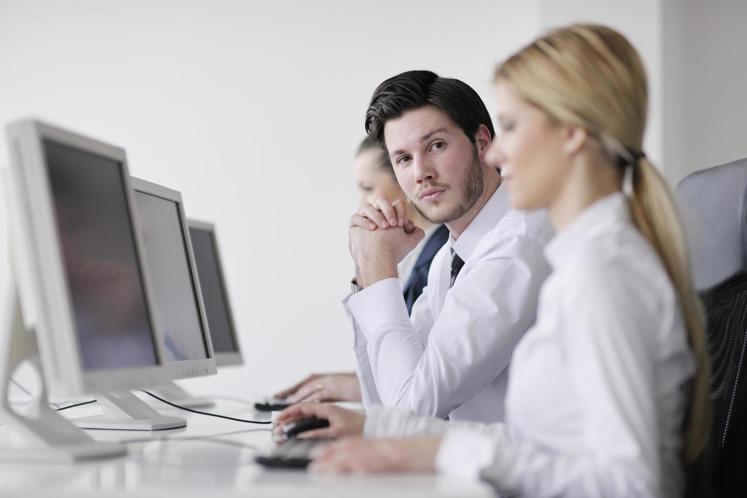 business people group working in customer and help desk office photo