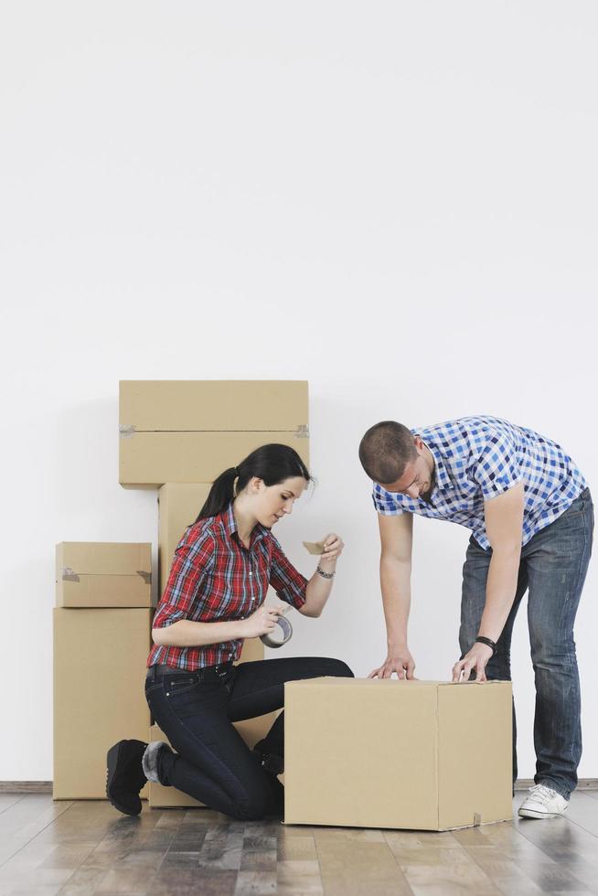 Young couple moving in new home photo