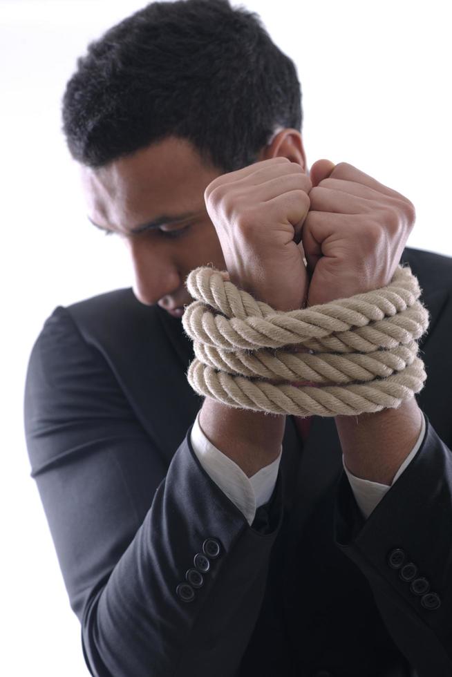 business man with rope isolated on white background photo