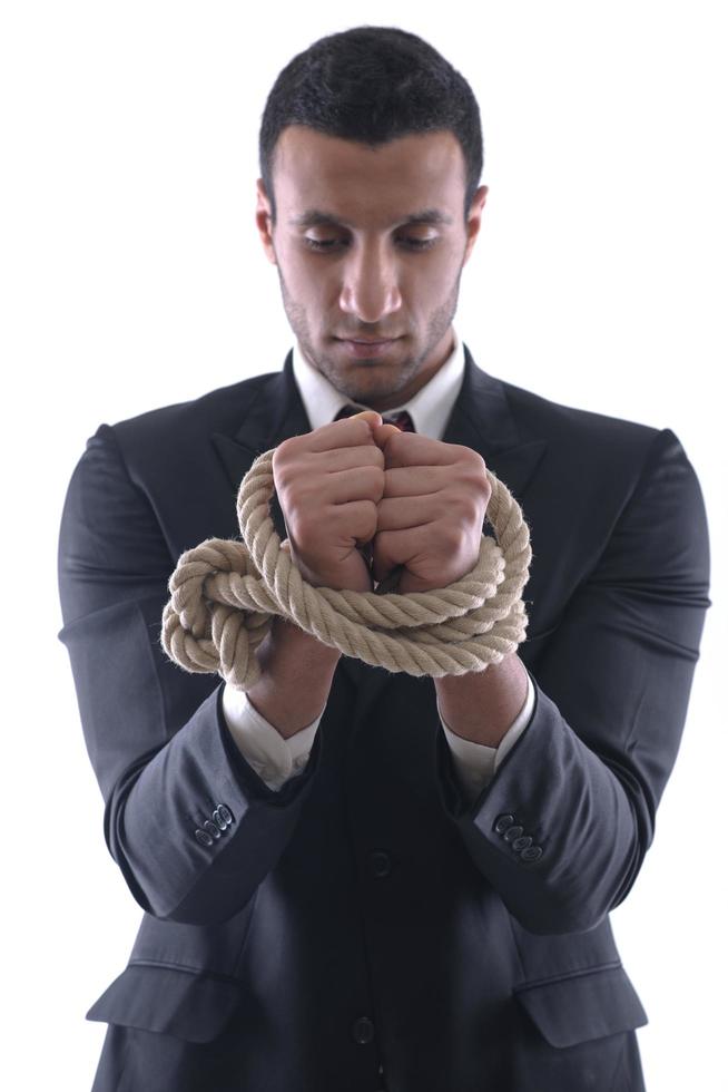 business man with rope isolated on white background photo