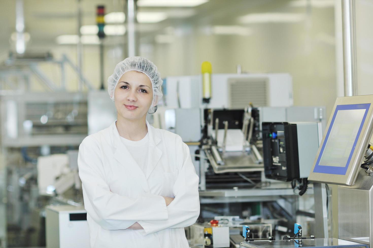 woman worker in pharmacy company photo