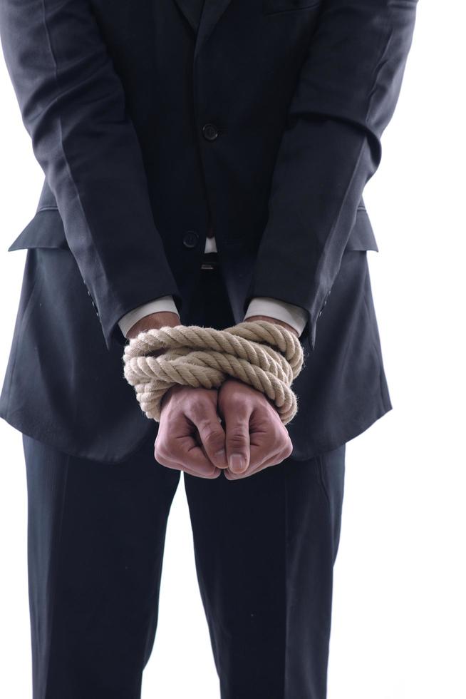 business man with rope isolated on white background photo