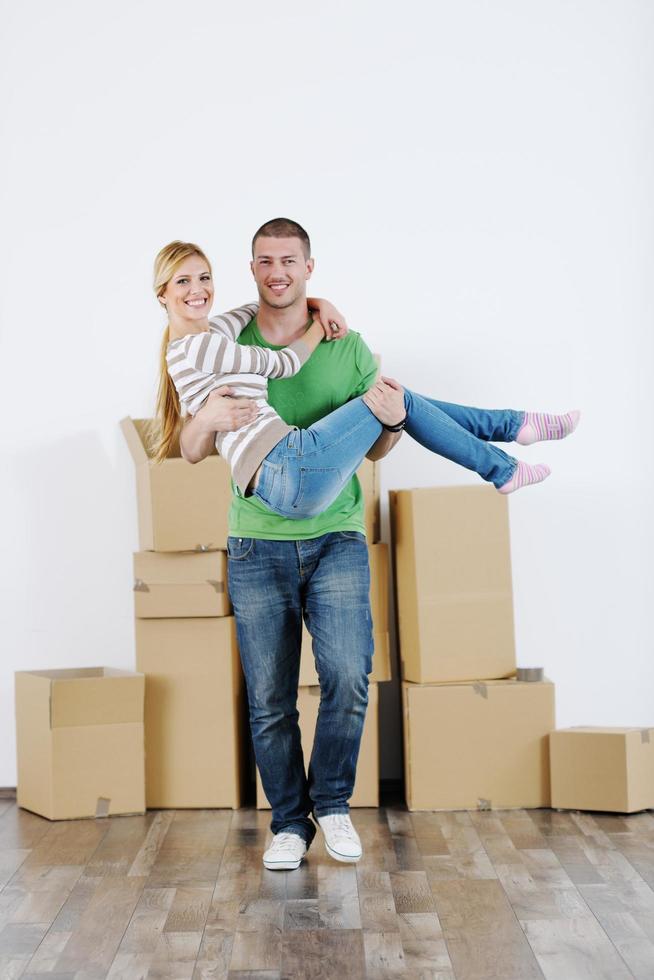 Young couple moving in new house photo