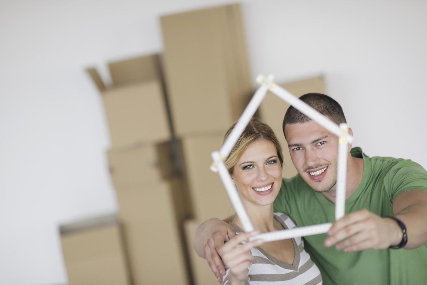 Young couple moving in new home photo