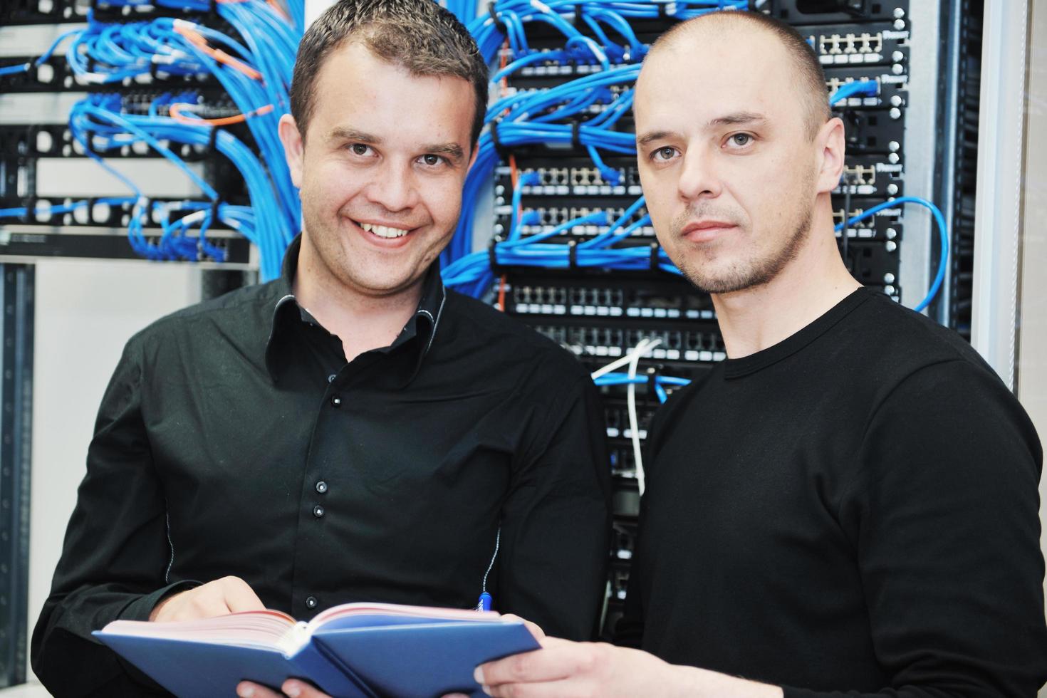 it engineer in network server room photo