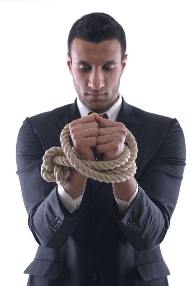 business man with rope isolated on white background photo