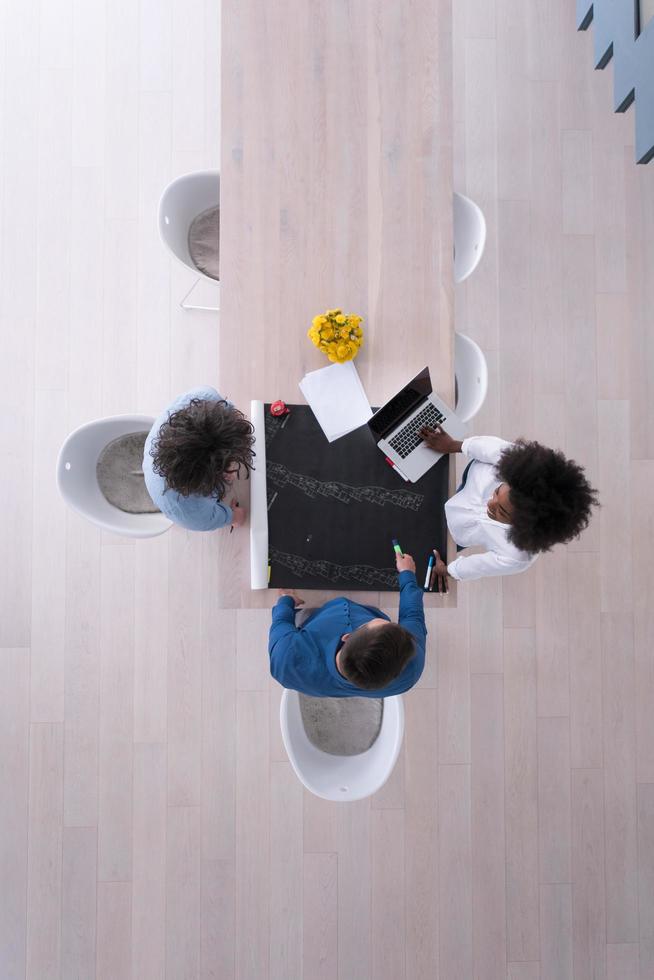 top view of Multiethnic startup business team on meeting photo