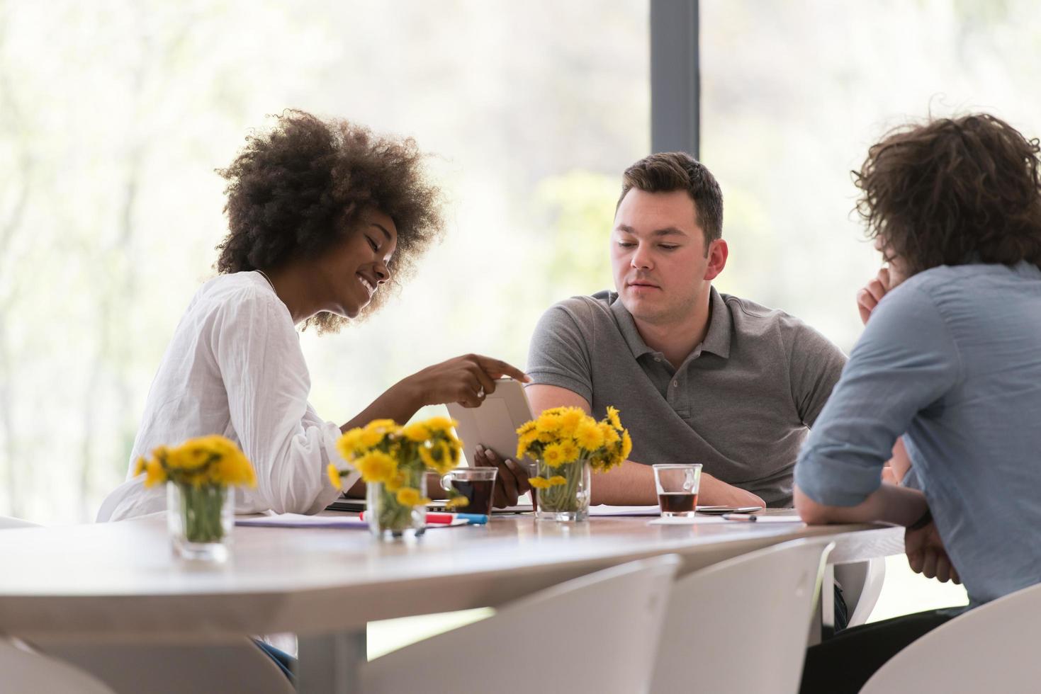 Multiethnic startup business team on meeting photo