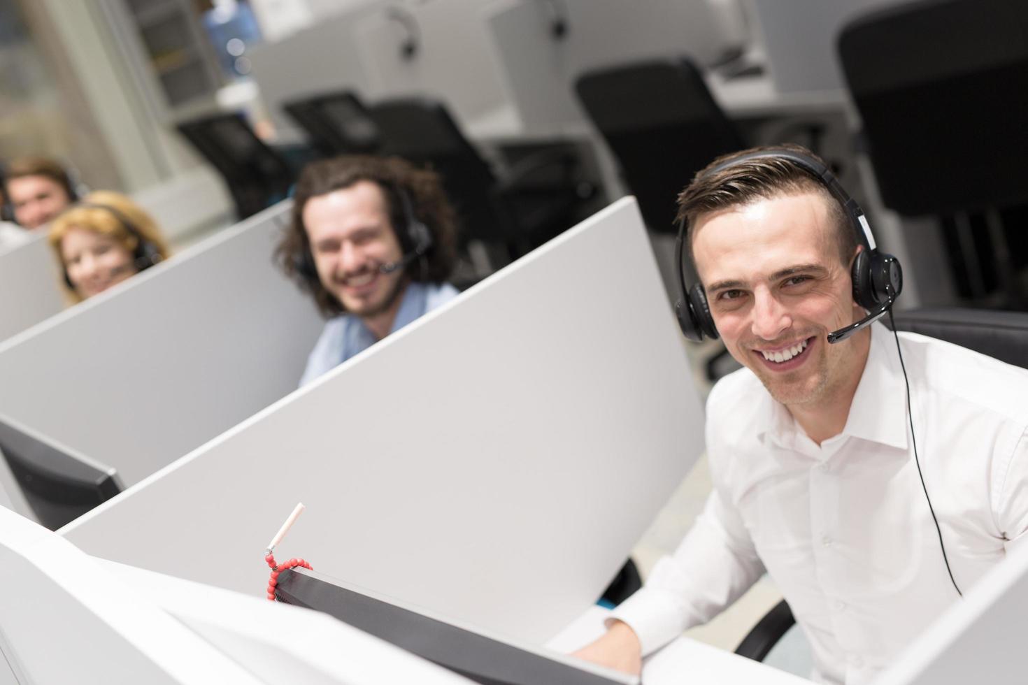 male call centre operator doing his job photo