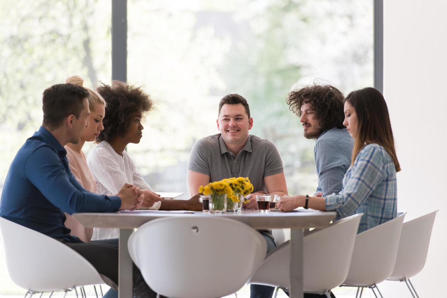 Multiethnic startup business team on meeting photo