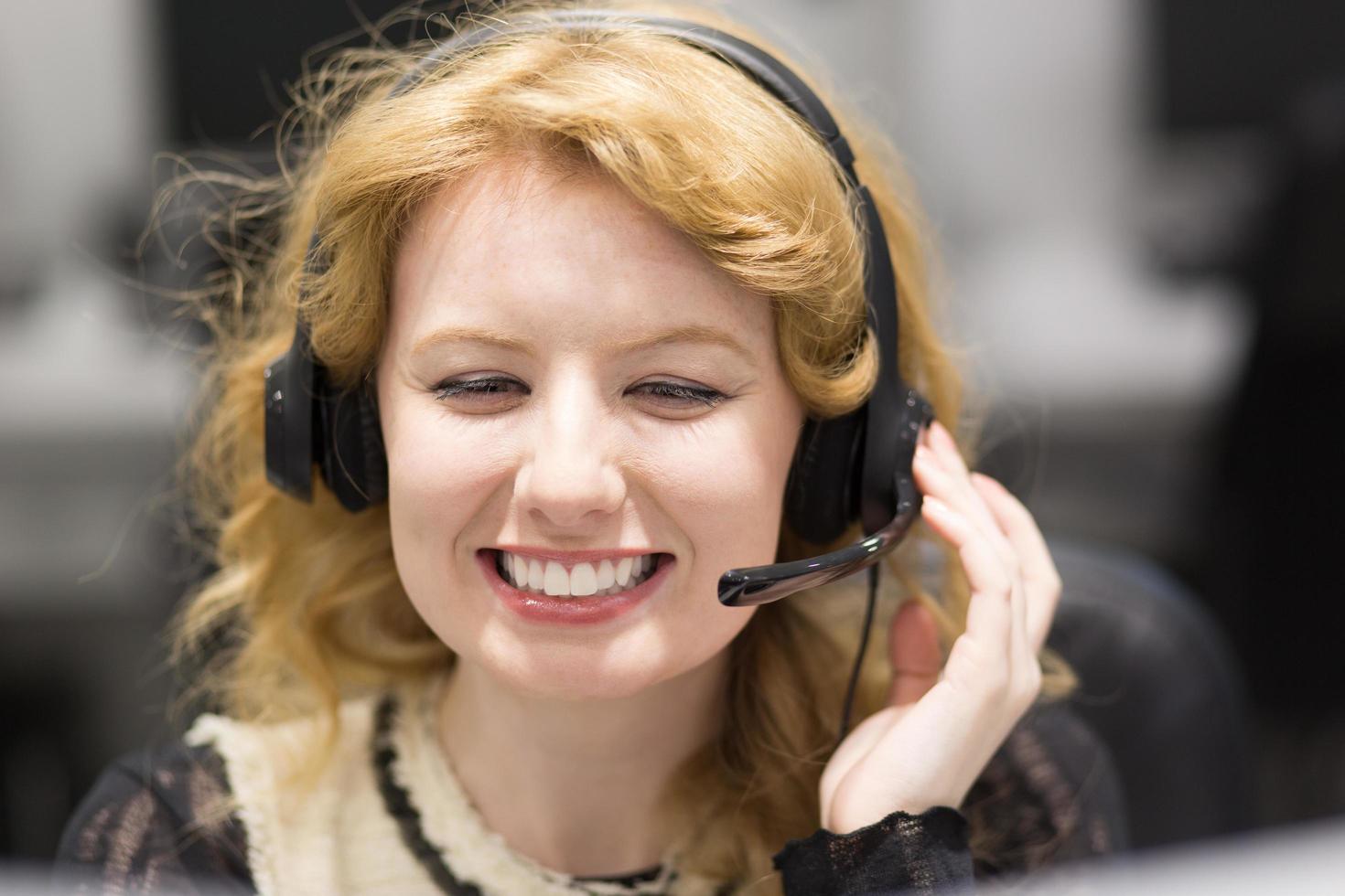 female call centre operator doing her job photo
