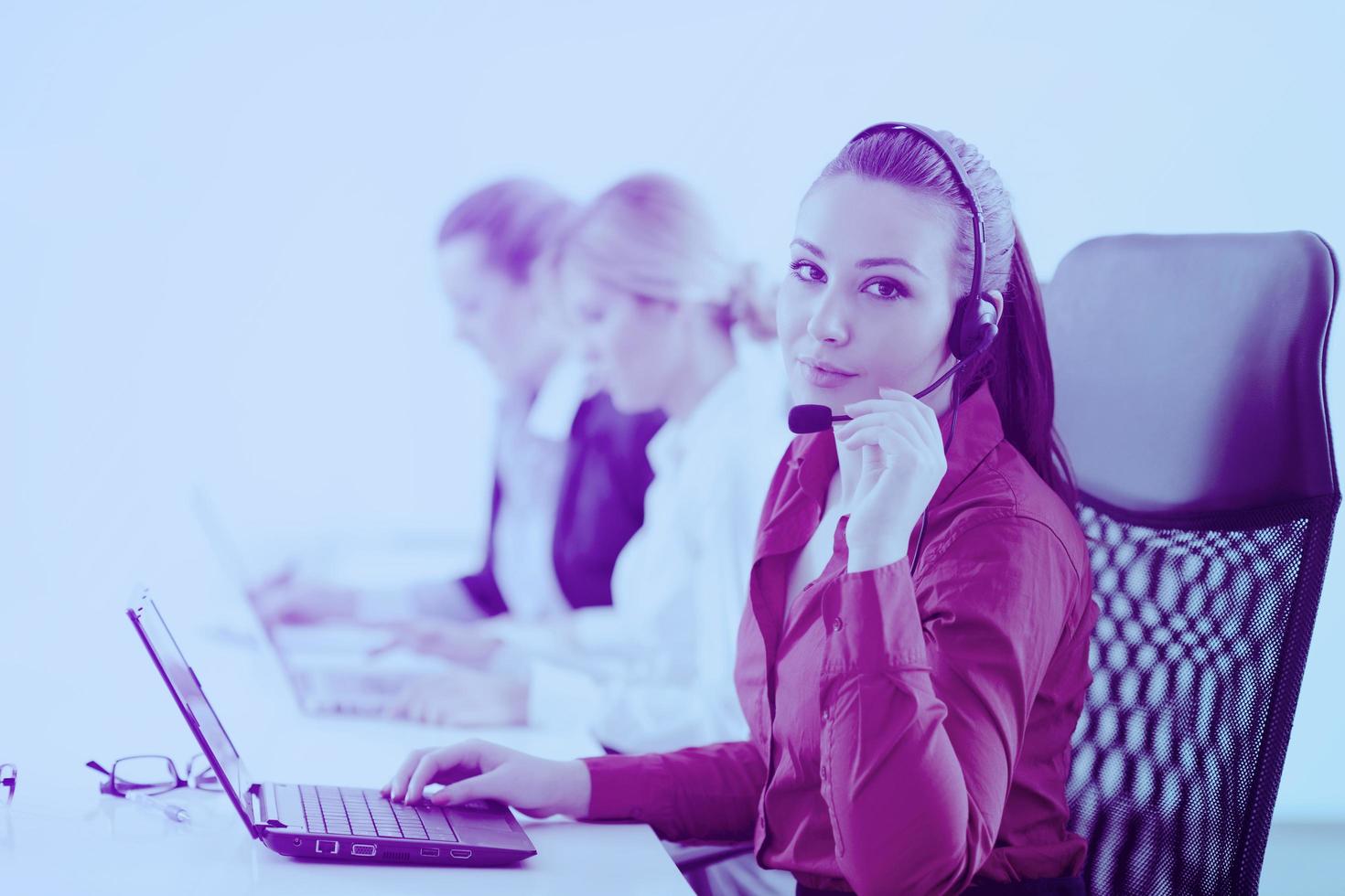 business woman group with headphones photo