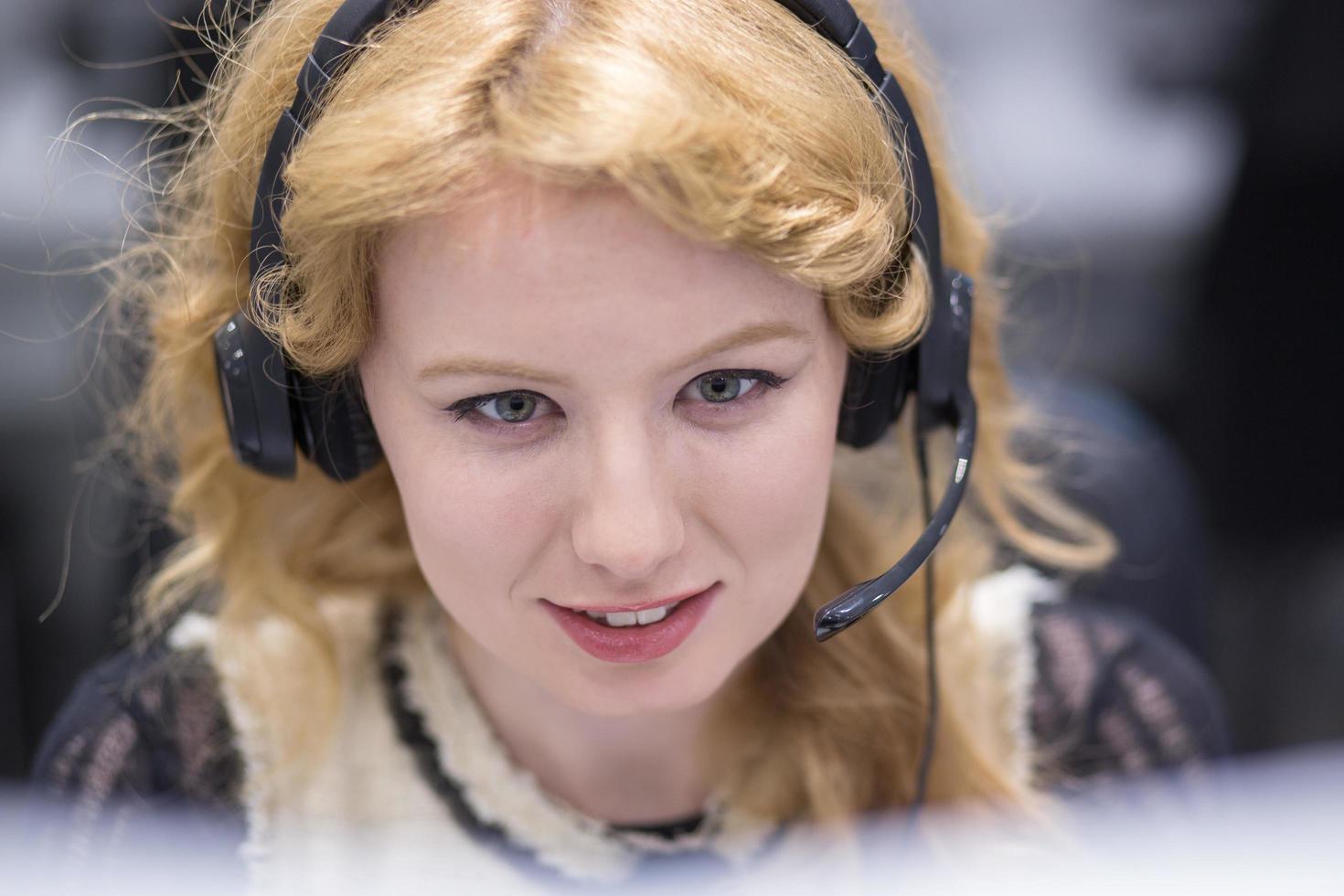 female call centre operator doing her job photo