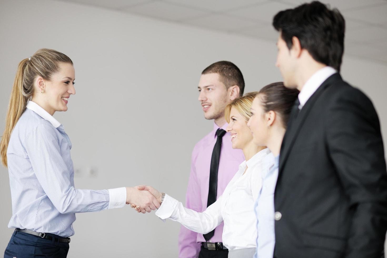 Group of young business people at meeting photo