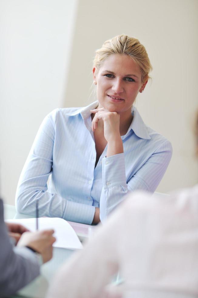 young business woman on meeting photo