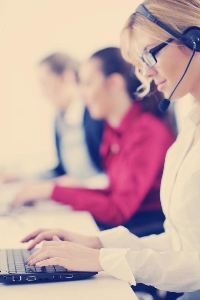 business woman group with headphones photo