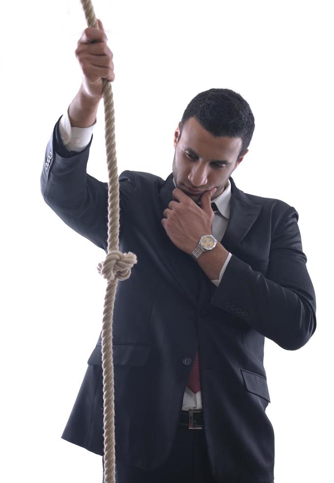 business man with rope isolated on white background photo