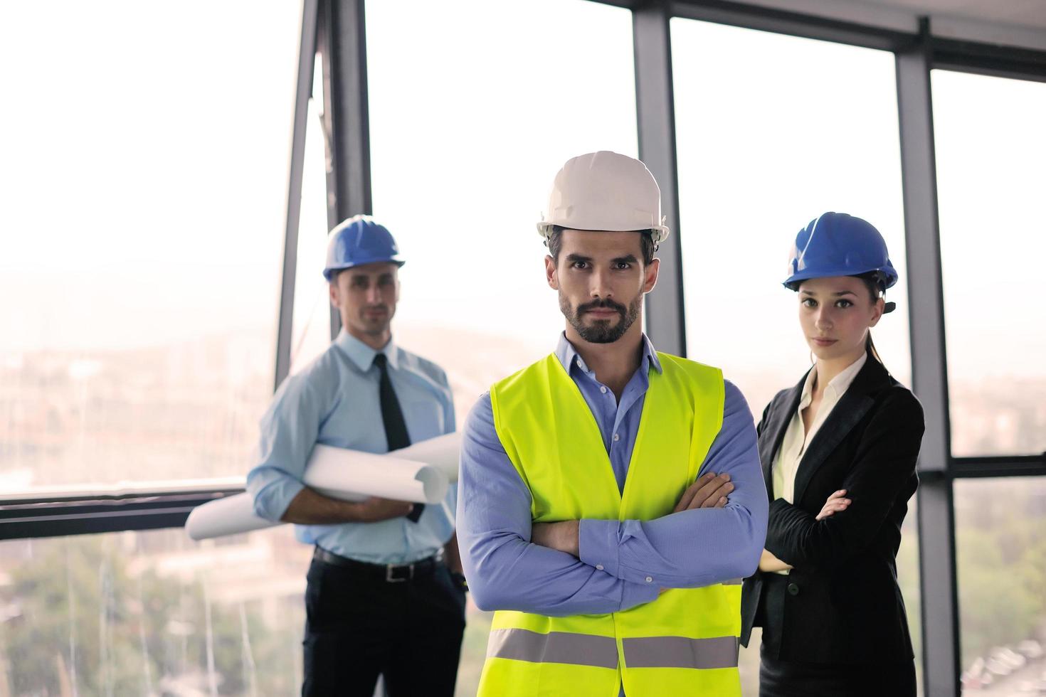 business people and engineers on meeting photo