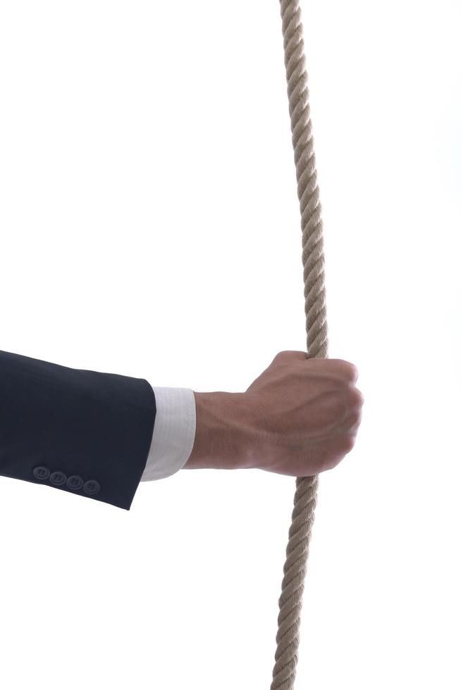 hombre de negocios con cuerda aislado sobre fondo blanco foto