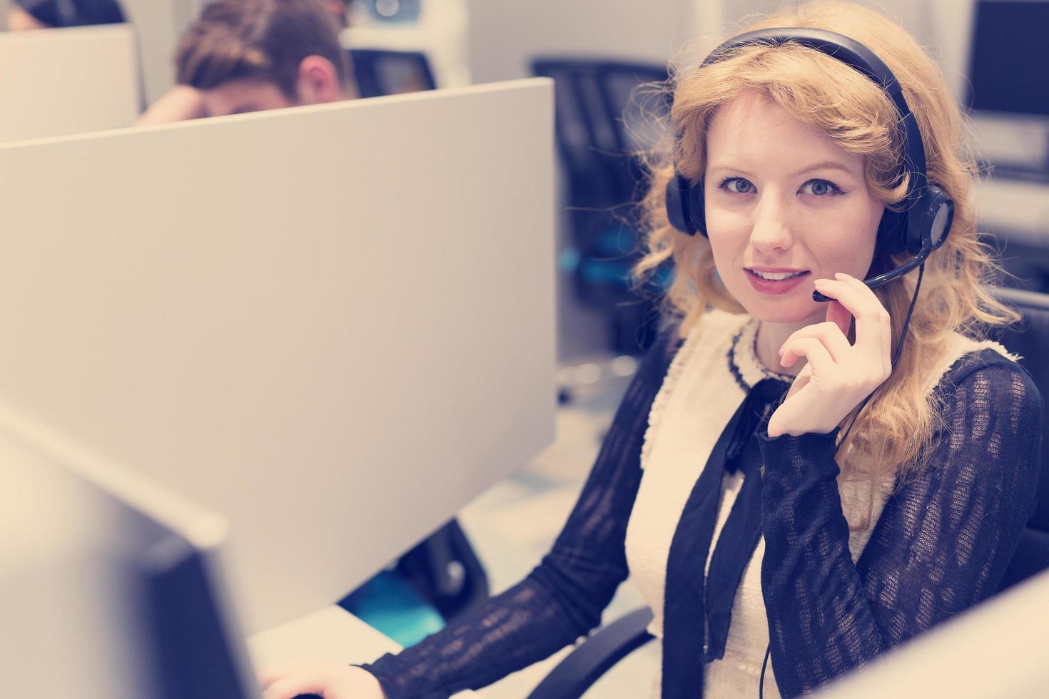 female call centre operator doing her job photo