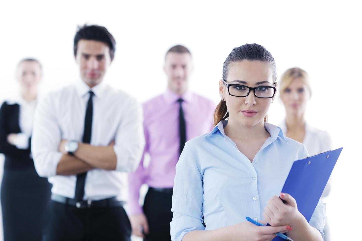 business woman standing with her staff in background photo