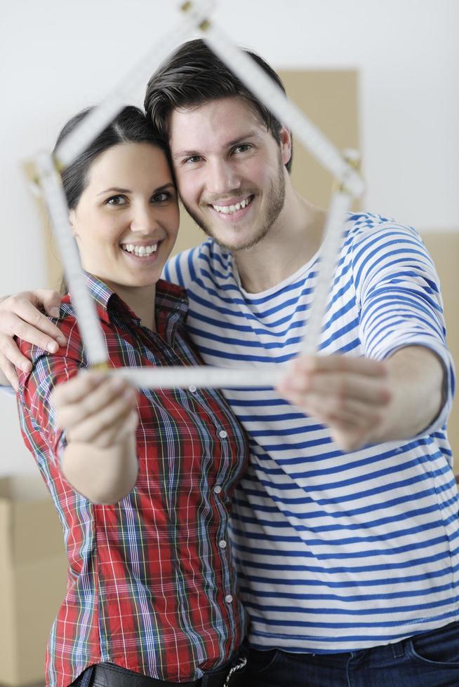 Young couple moving in new home photo