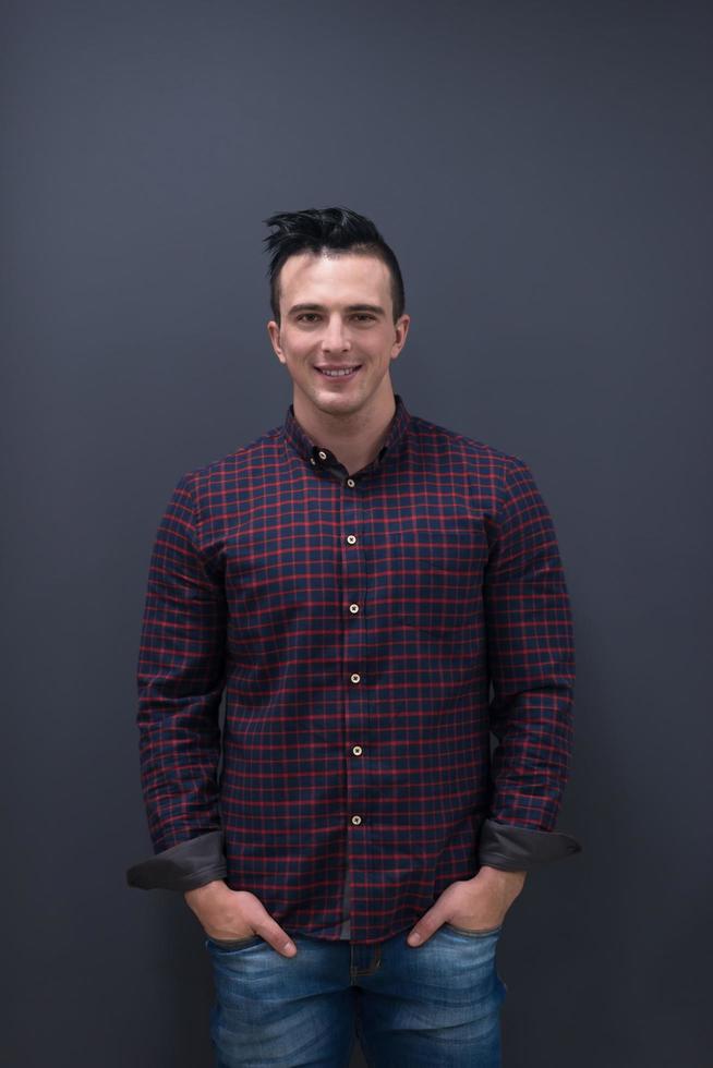 portrait of young startup business man in plaid shirt photo