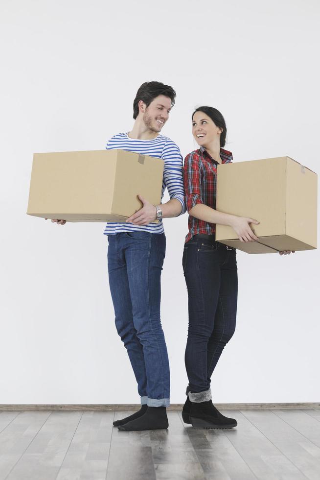 Young couple moving in new home photo