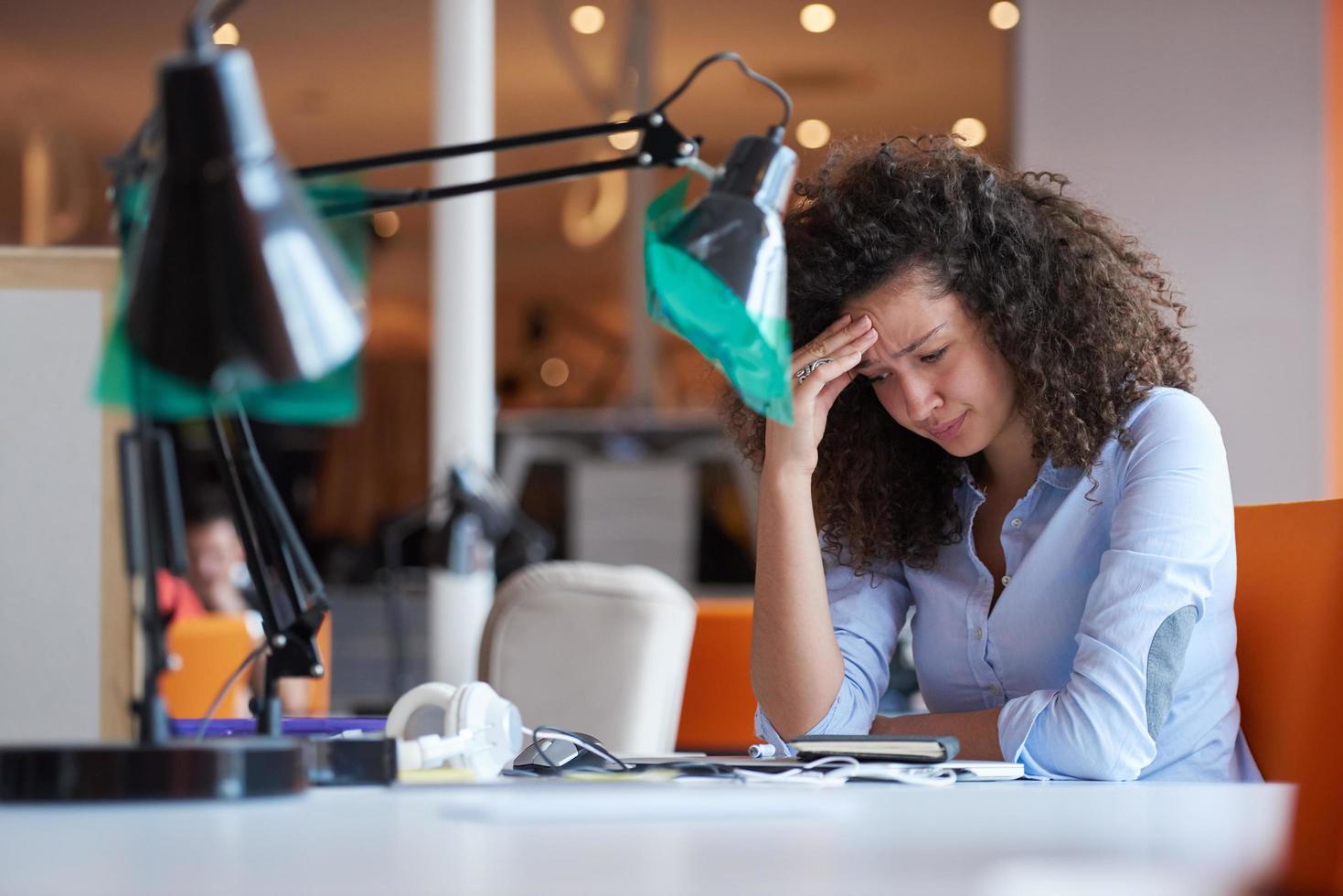 young  business woman at office photo