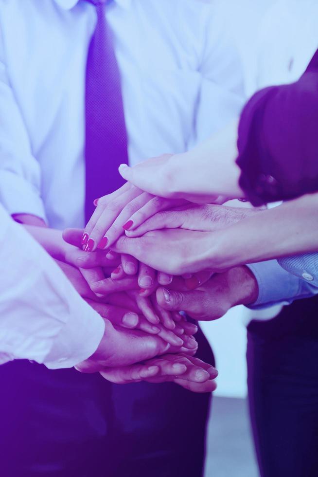 business people group joining hands photo