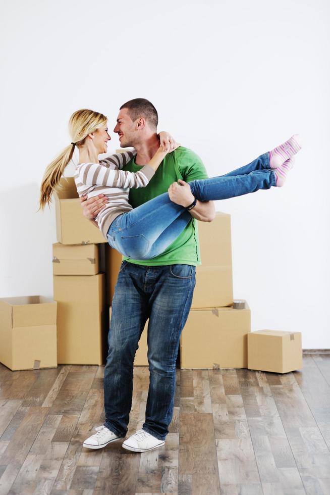 Young couple moving in new house photo