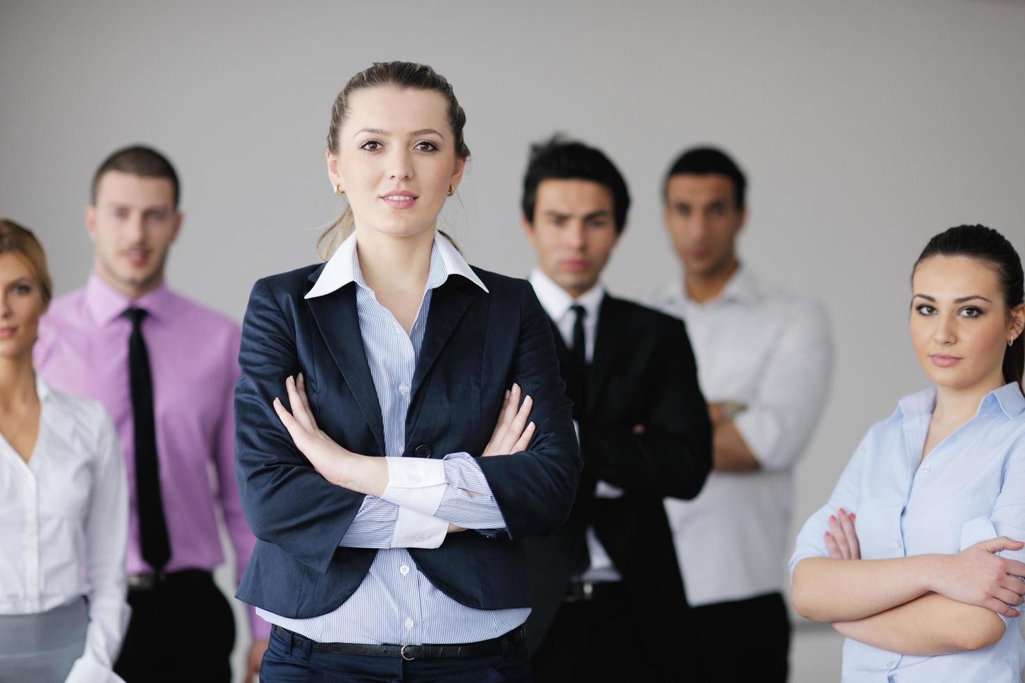 Group of young business people at meeting photo