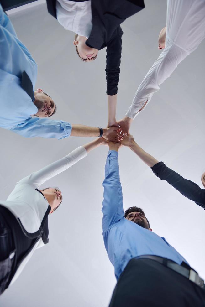 business people group joining hands photo