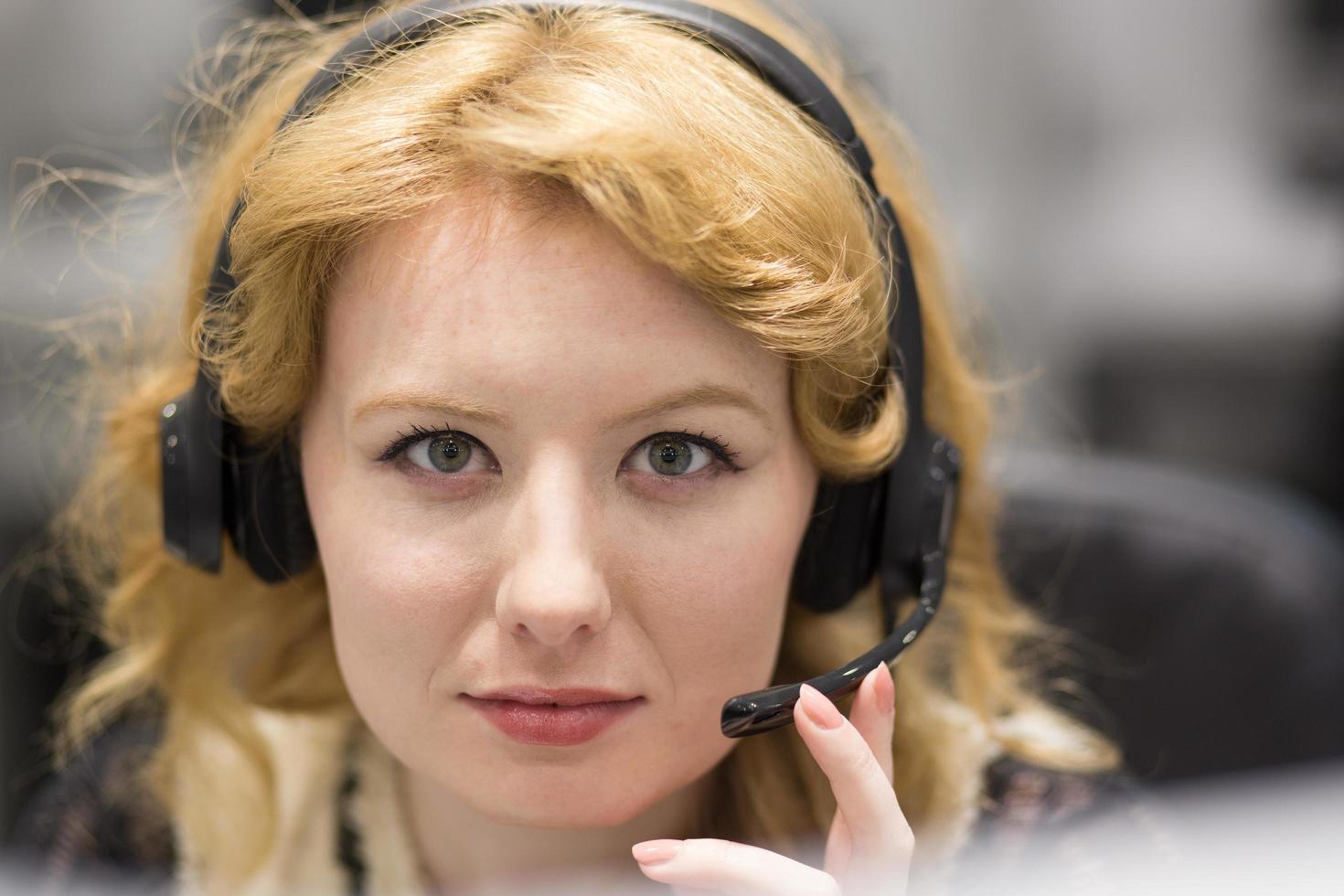 female call centre operator doing her job photo