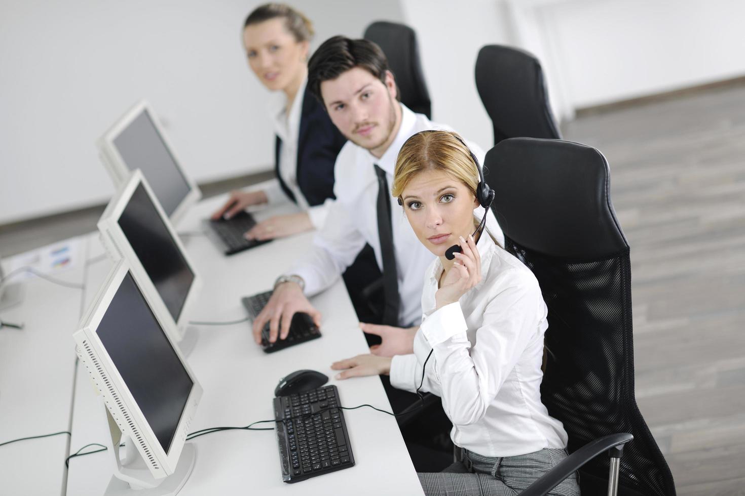 business people group working in customer and help desk office photo