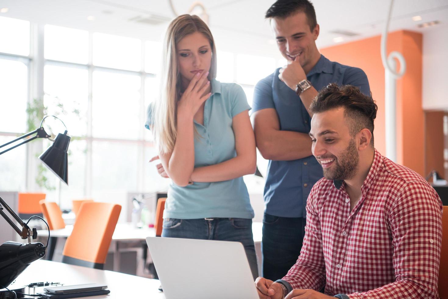 Group of young people employee workers with computer photo