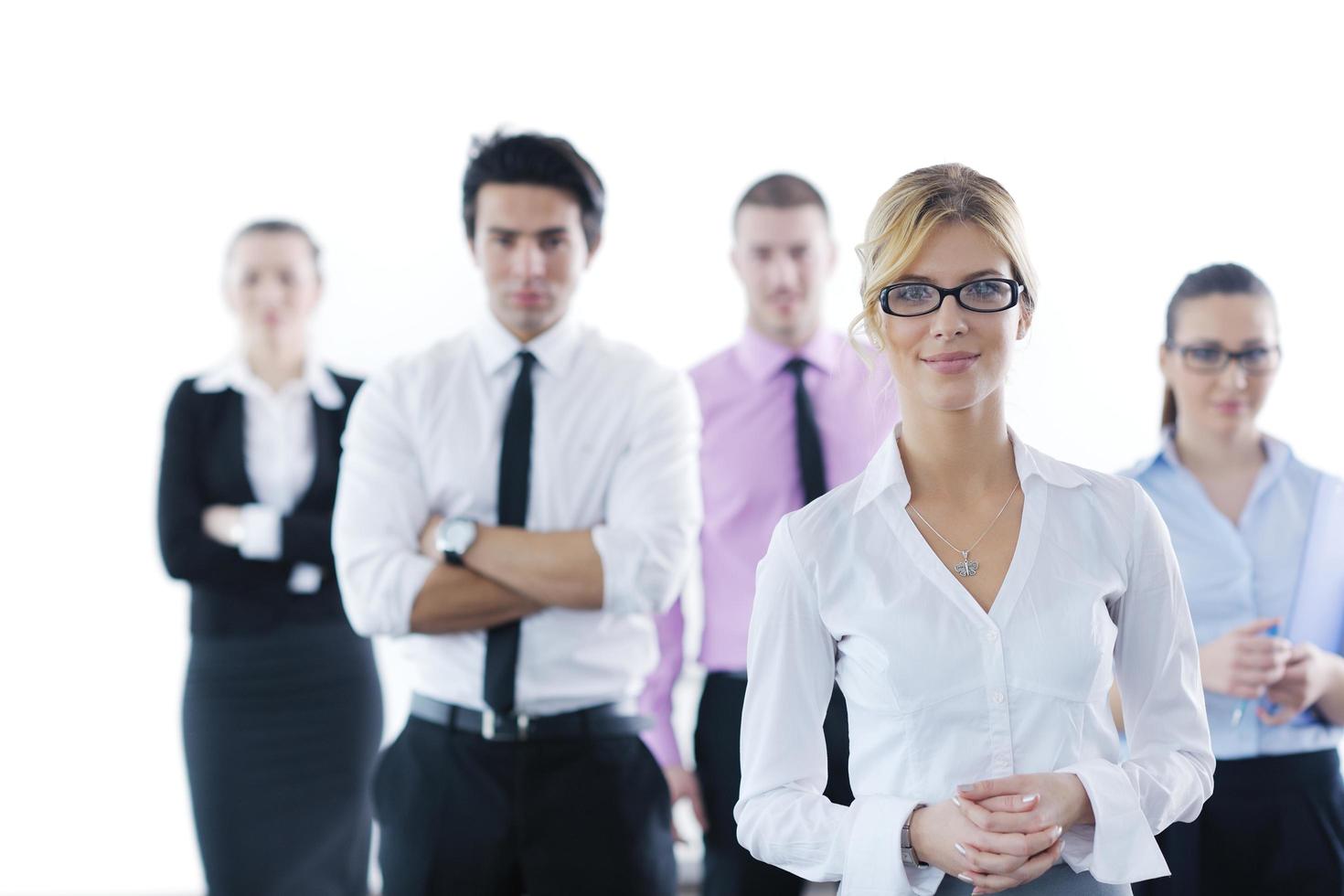 business woman standing with her staff in background photo