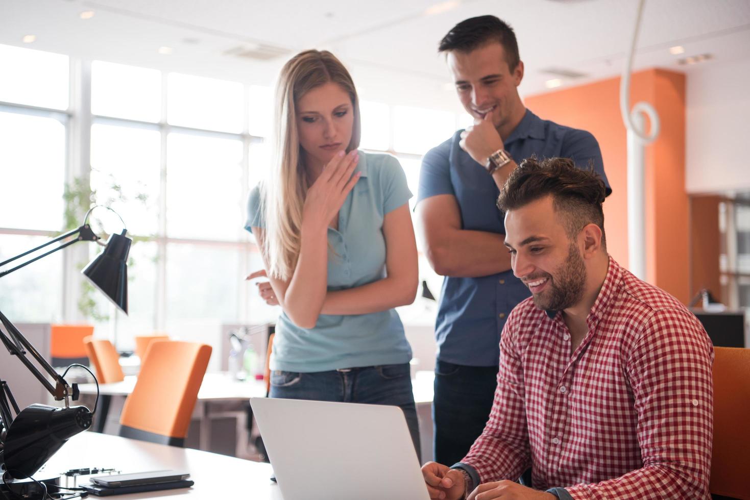 Group of young people employee workers with computer photo