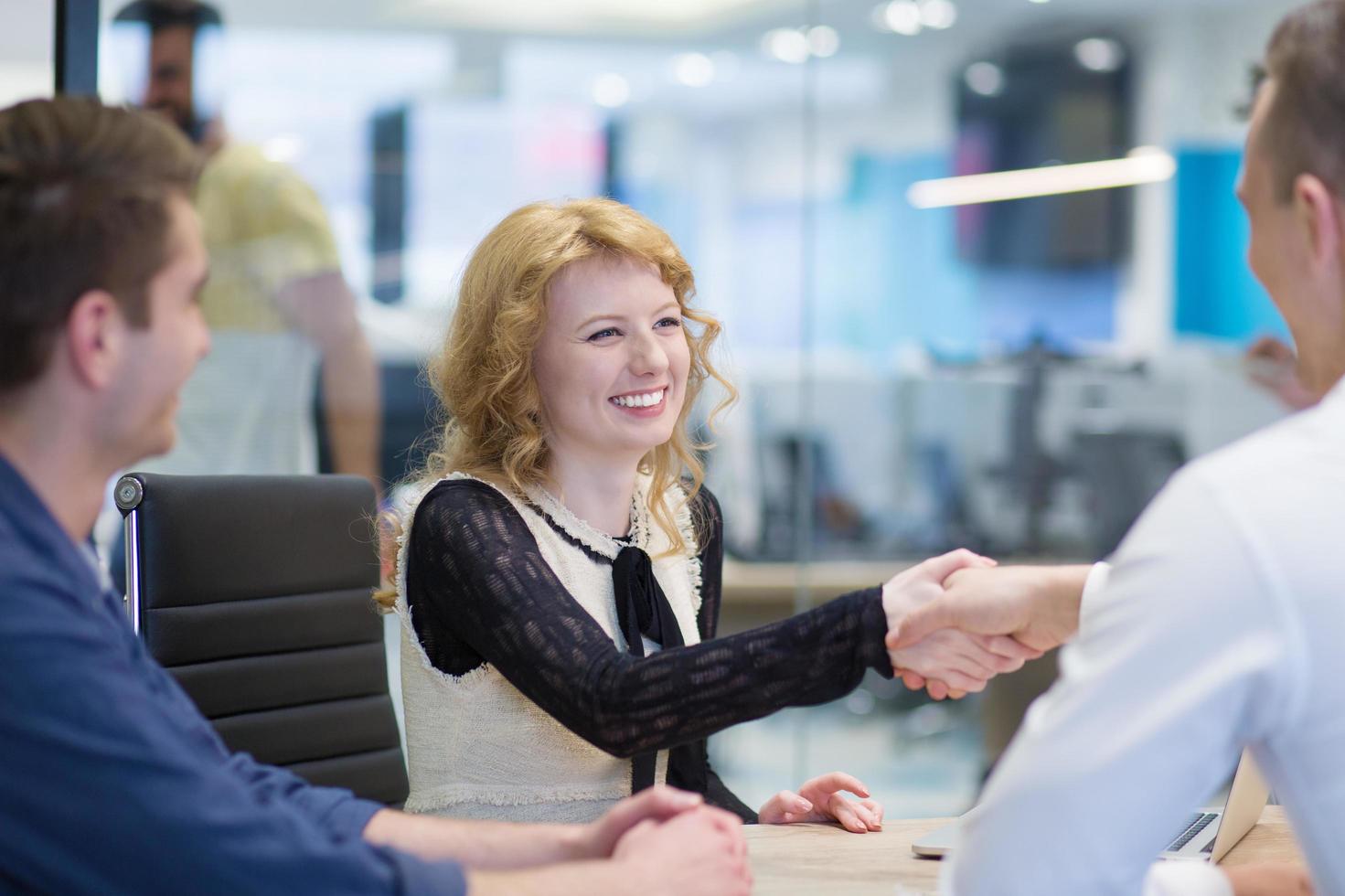 cloasing the deal in modern office interior photo