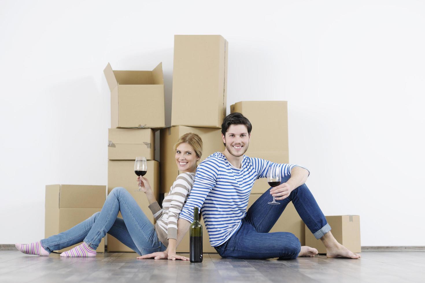 Young couple moving in new home photo