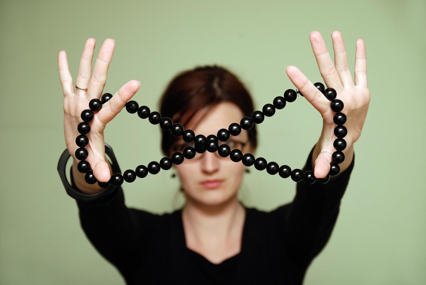 Female with black pearls photo