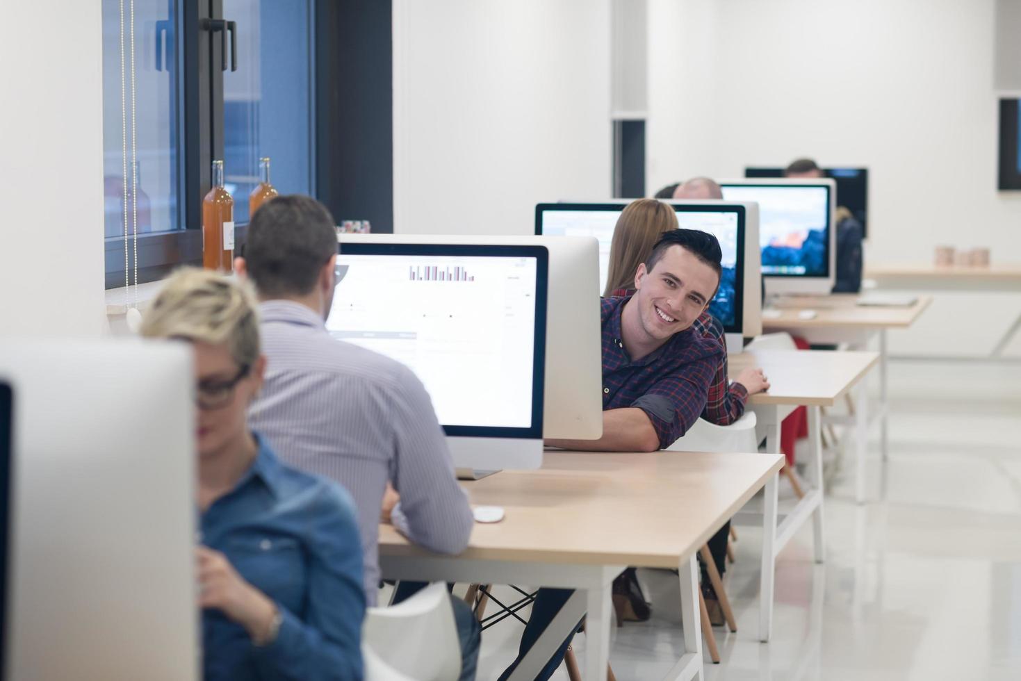 startup business, software developer working on desktop computer photo