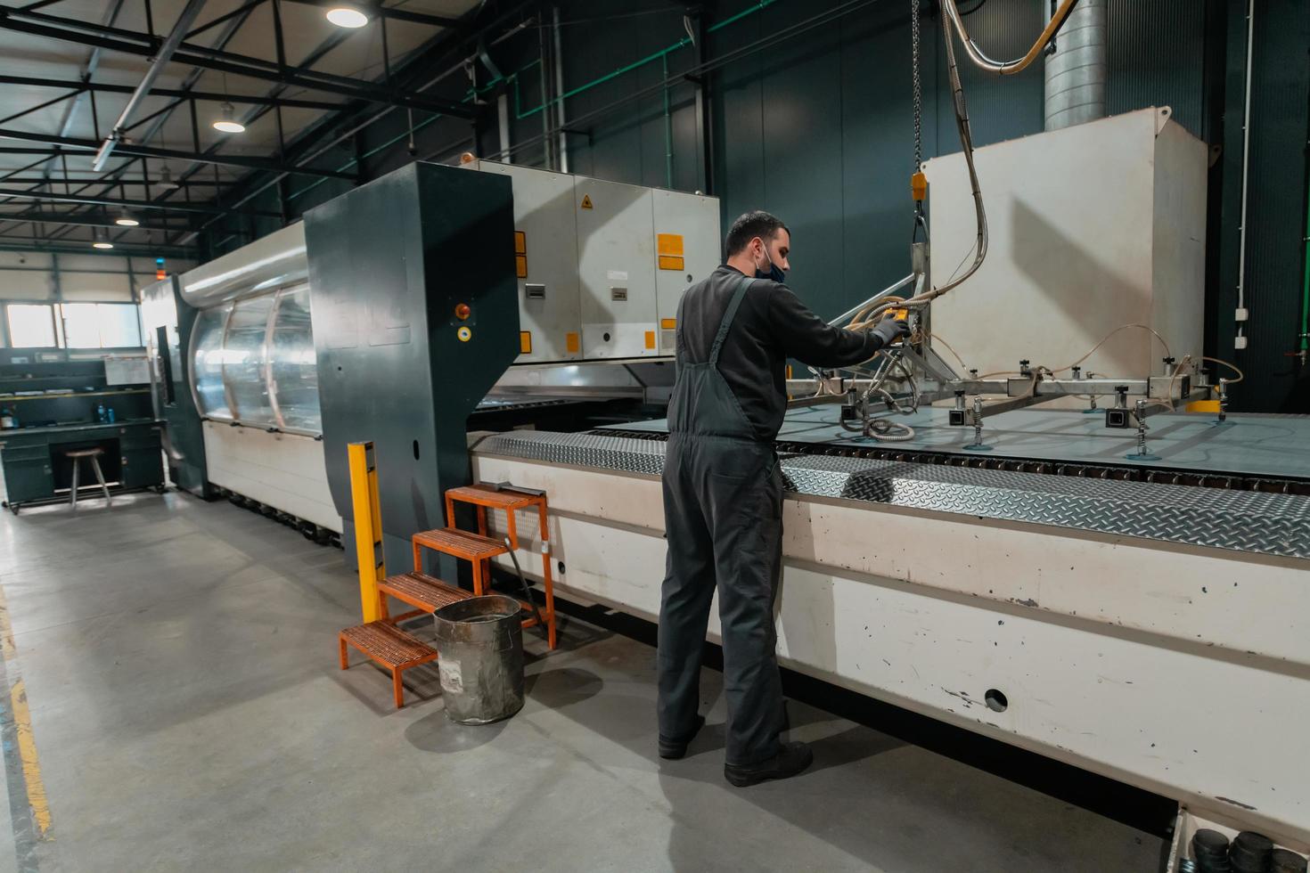 Turkey, 2022 A smart factory worker or engineer wearing a face mask