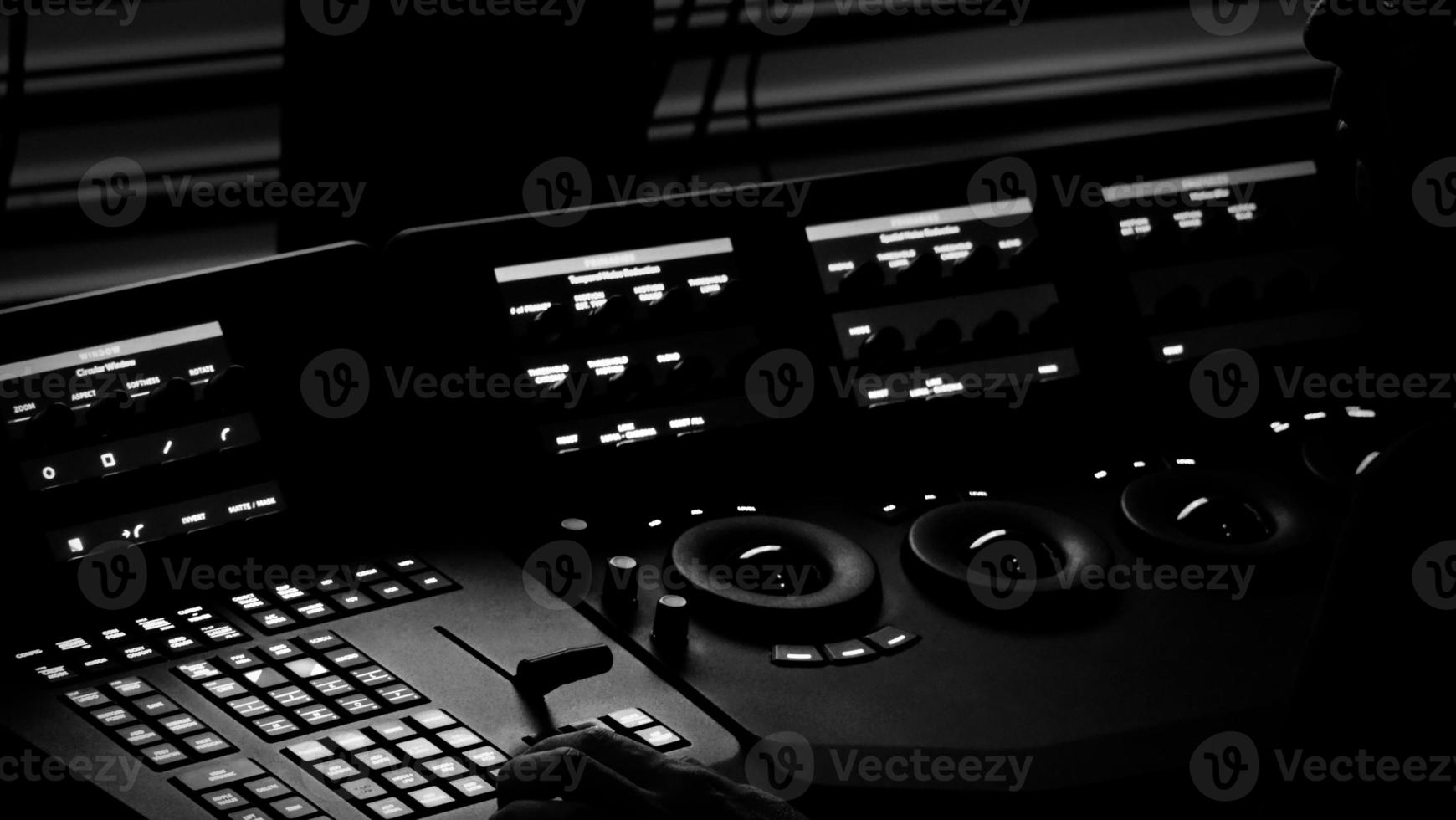 Edit video production control panel in studio. Editor editing and grade film in movie post room. photo