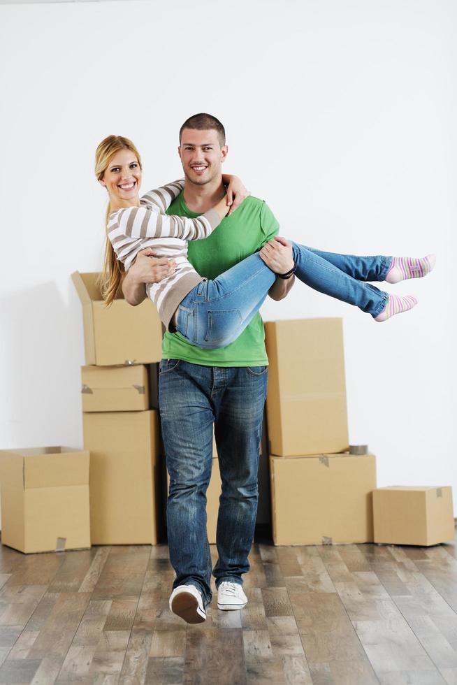 Young couple moving in new house photo