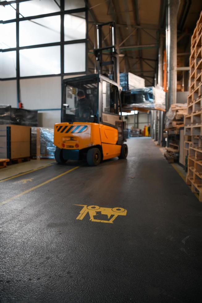 Turkey, 2022 - Forklift loader in storage warehouse ship yard. Distribution products. Delivery. Logistics. Transportation. Business background photo