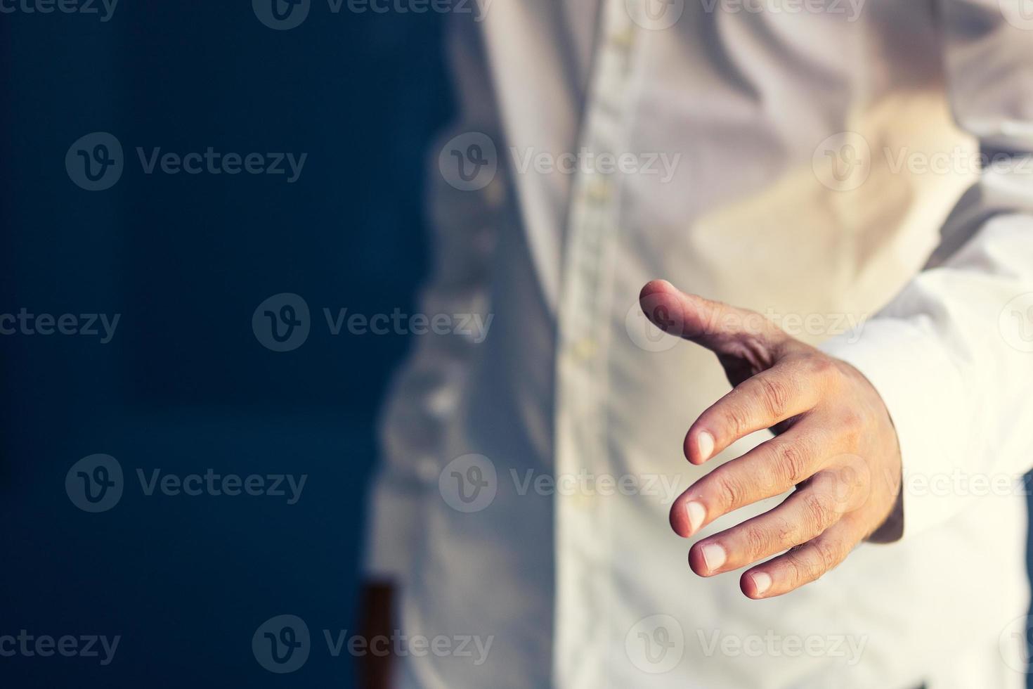 Left handed man shaking hands. 12087416 Stock Photo at Vecteezy